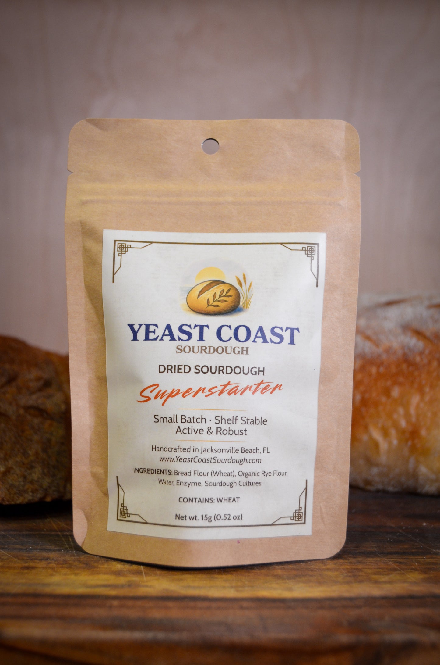 Yeast Coast Dried Sourdough Superstarter package with bread in the background