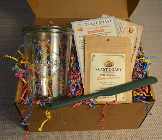 Gift box with premium Weck jar, Yeast Coast Sourdough Superstarter, instruction sheets, recipe, and festive decorative paper shreds