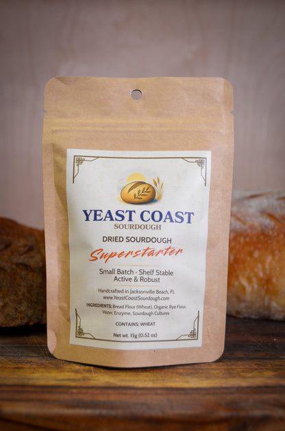 Yeast Coast Dried Sourdough Superstarter package with bread in the background