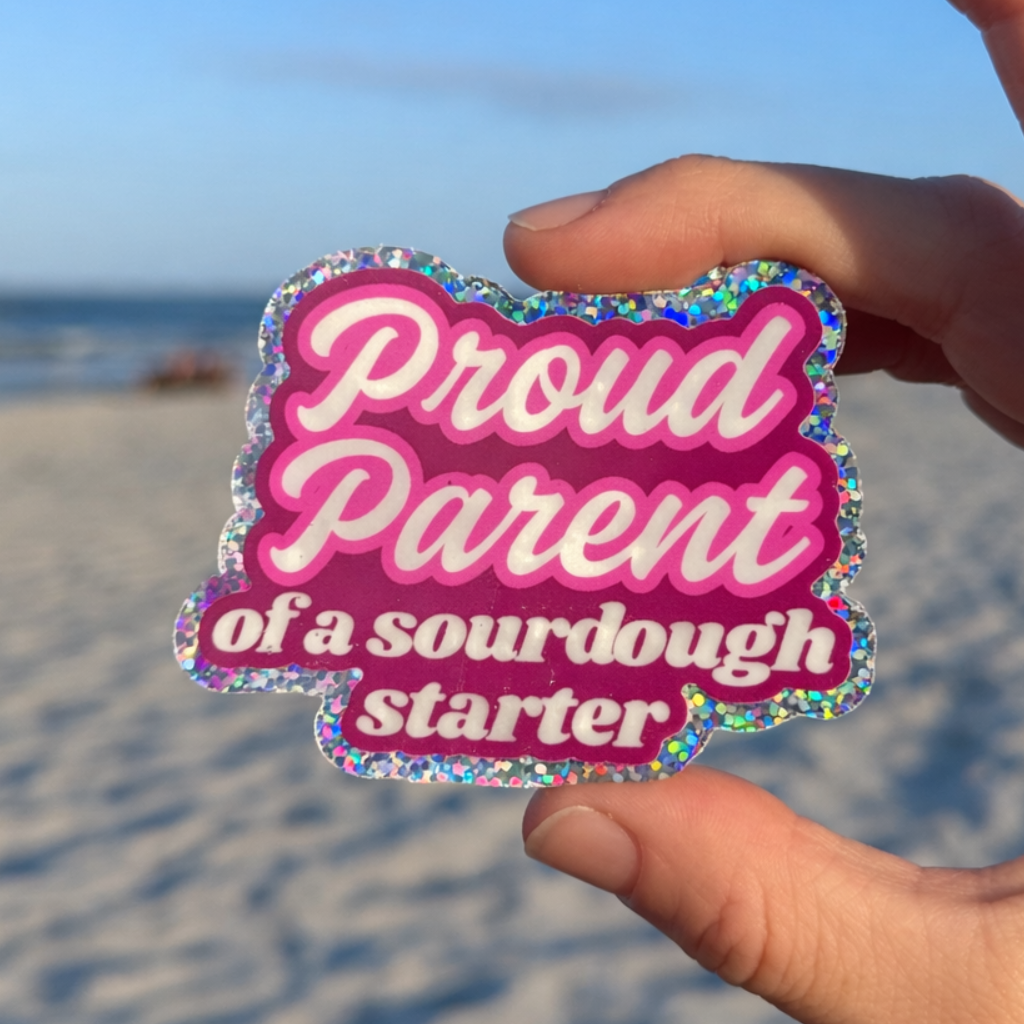 glitter sticker on beach background