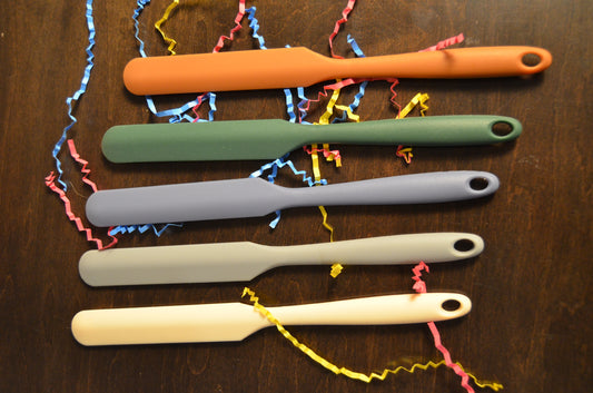 Color options for spurtle: clay, pine, slate, stone, sand